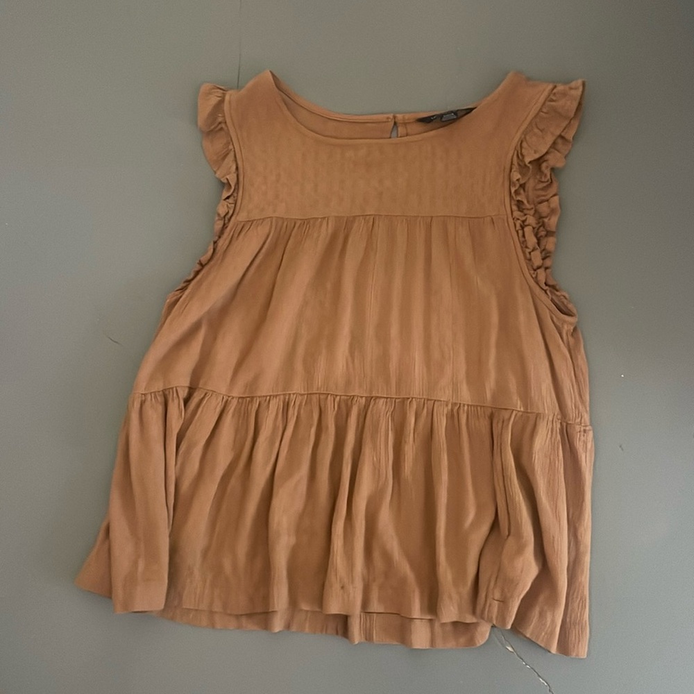 beige ruffle top